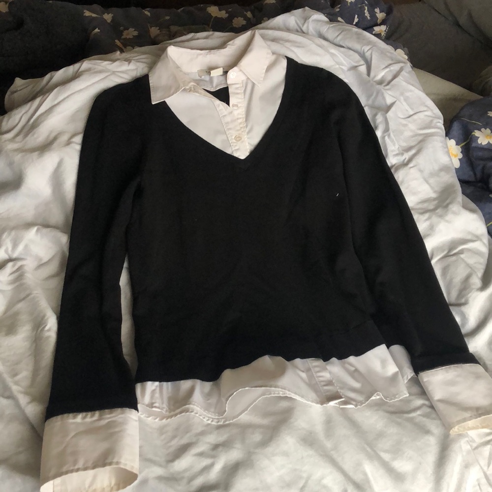 Women’s white dress shirt with black sweater